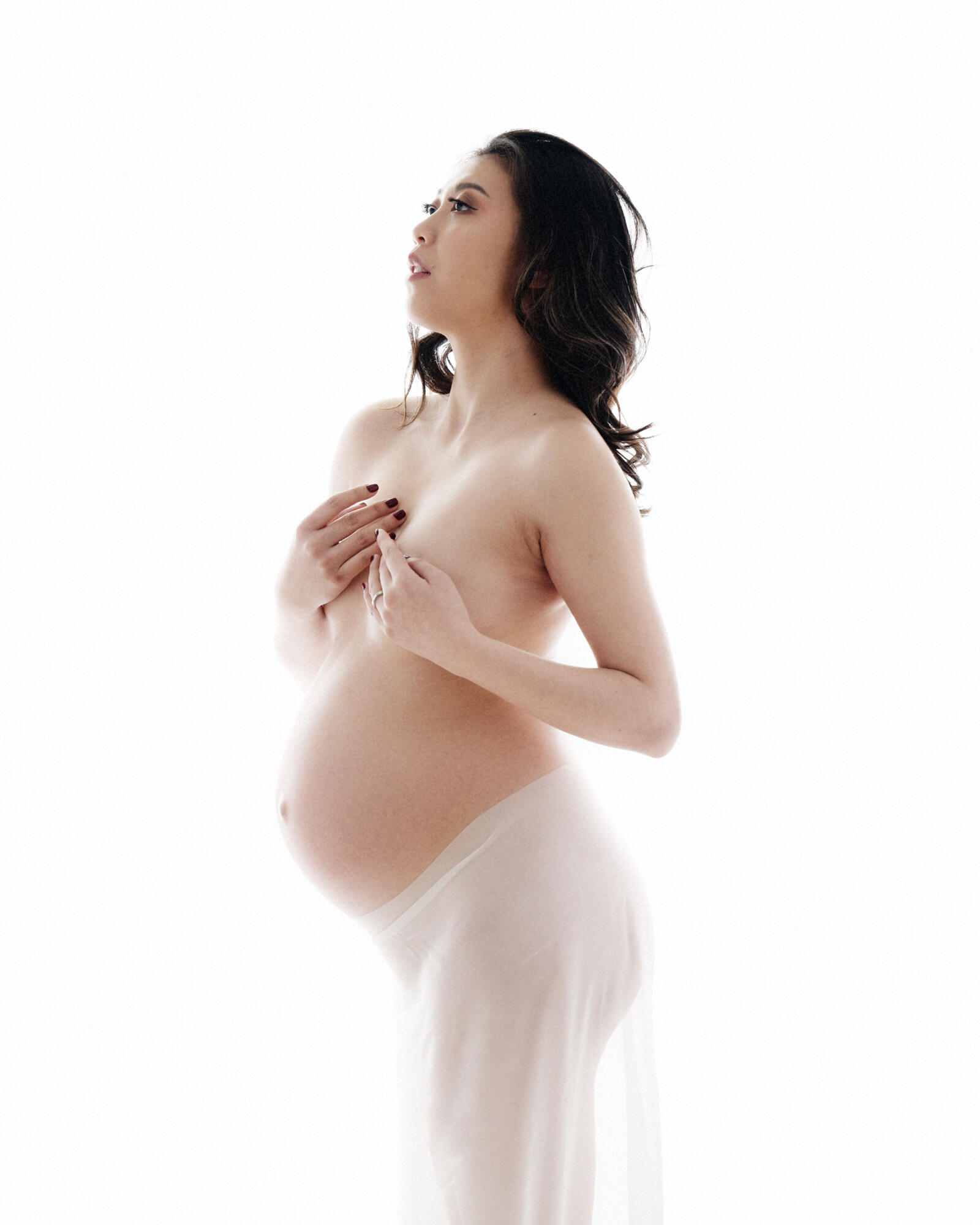 Chinese woman, maternity photoshoot draped in sheer fabric in Birmingham Tianna J-Williams Photography
