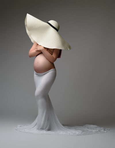 Artistic maternity photoshoot, fashionable pregnancy pictures